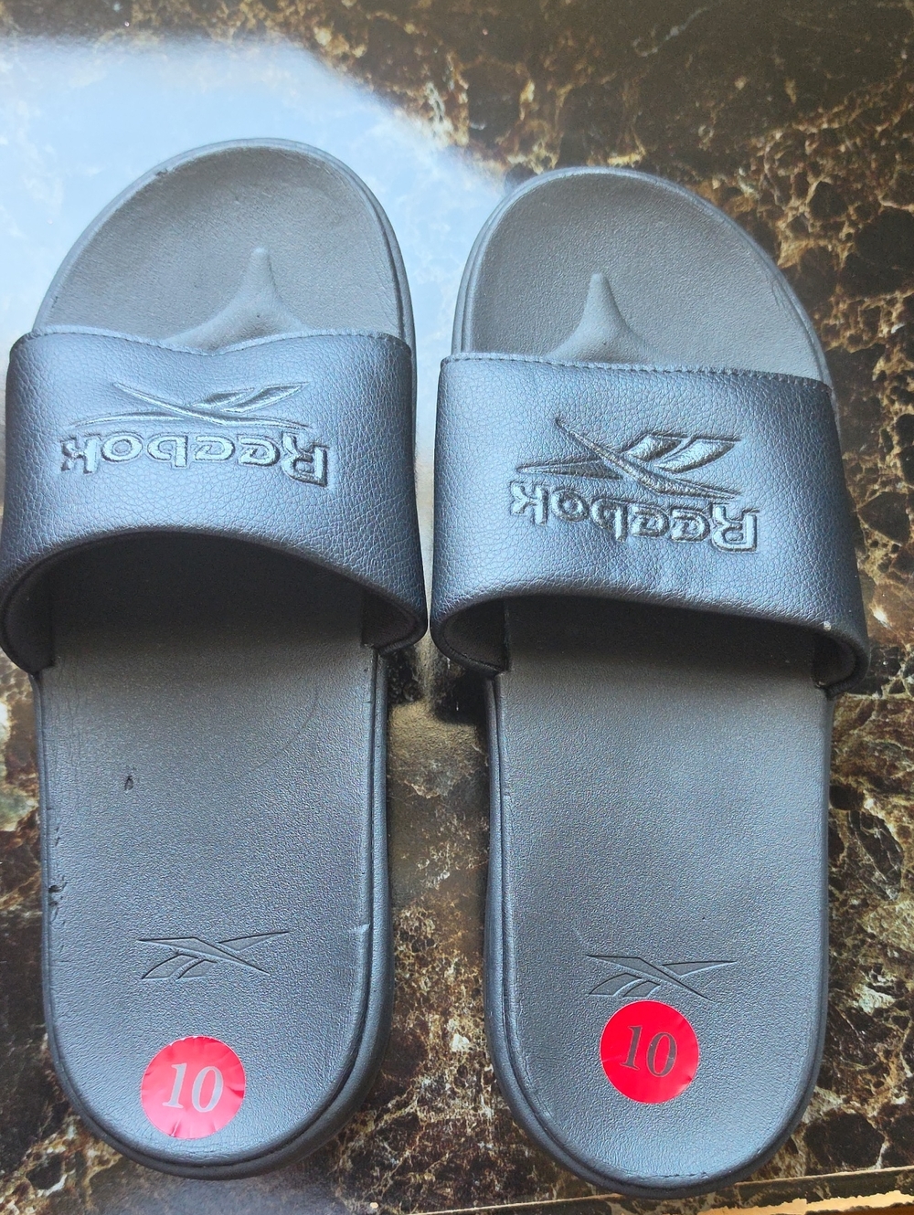 Reebok Women's Black Slide Sandals with Red Size Dot